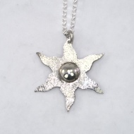 Silver estoile pendant